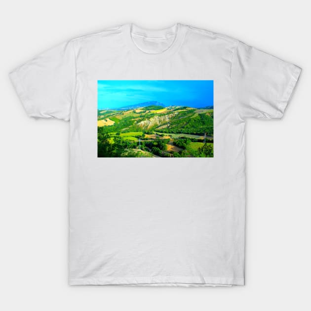 Scenery in Force with Monte dell'Ascensione, badlands, ravines, thickets, poles T-Shirt by KristinaDrozd